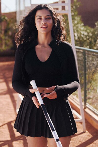 H&M تنورة تنس مطوية مع DryMove™