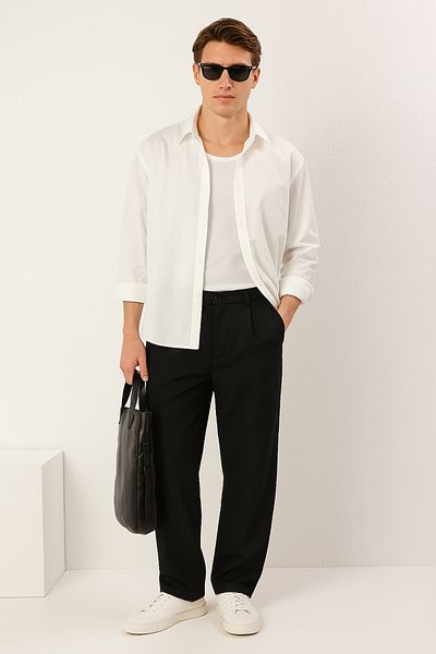 Trendyol Collection Schwarze Baggy-Hose mit weitem Bein und lockerem Stoff TMNSS23PL00039