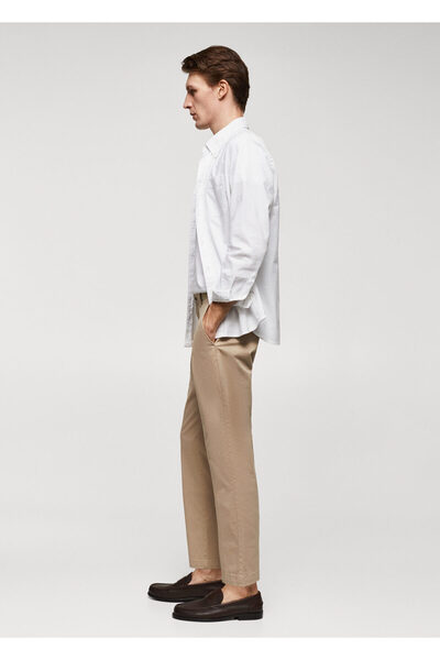 MANGO Man Tapered kesim pamuklu cropped pantolon