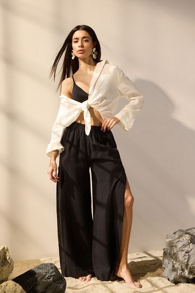 Trendyol Collection Schwarze, gewebte Strandhose aus 100 % Leinen mit Schlitz TBESS25PL00004