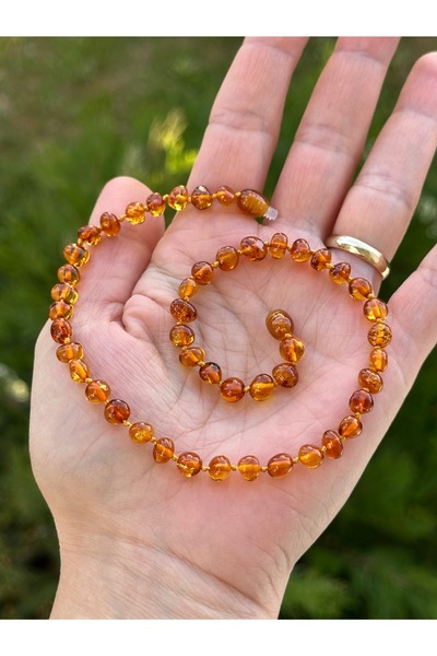 KEHRİBAREVİ KARAMAN Kehribar Kolye Damla Kehribar Diş Kolyesi Sertifikalı