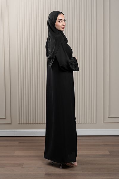 LAVİNİA Lavinia women's abaya with embroidery, stitched sleeves, crystals, and embroidered hijab trim.