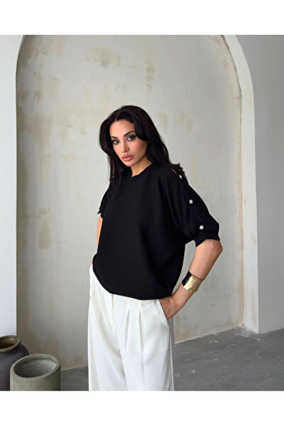 novalook بلوزة بأكمام خفاش ناعمة من الخيط البارد مع تفاصيل أزرار