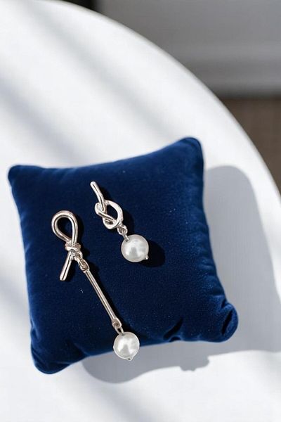 BeyzHal Silver Color Asymmetrical Knot Design Pearl Dangle Earrings Stylish and Modern Women's Jewelry Model