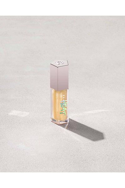 FENTY BEAUTY GLOSS BOMB HEAT UNIVERSAL LIP LUMINIZER + PLUMPER Lemon Lava - clear with gold shimmer