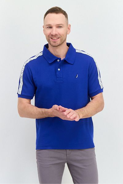 Nautica قميص بولو رجالي بقصّة عادية وأكمام قصيرة وشعار مطرز، أزرق