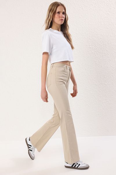 Trendyol Collection Бежови клоширани дънки с висока талия TWOSS25JE00281