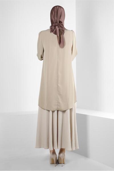 Alvina ASYMMETRIC CUT TUNIC WITH FLOWER ACCESSORY 43610