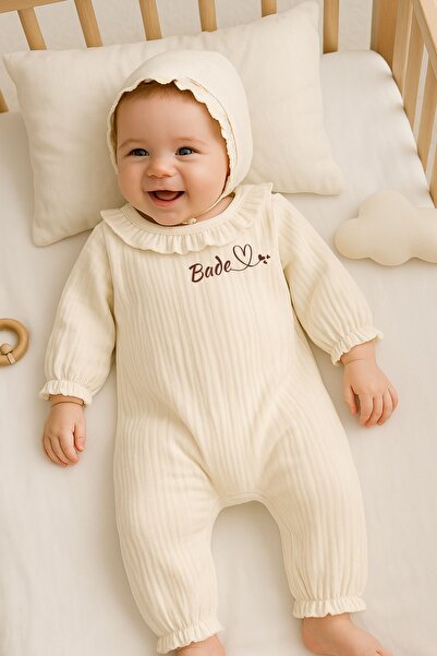 Minytrendy İsimli Yenidoğan Tulum Kız Bebek Organik Müslin Fırfırlı Yaka Hast...