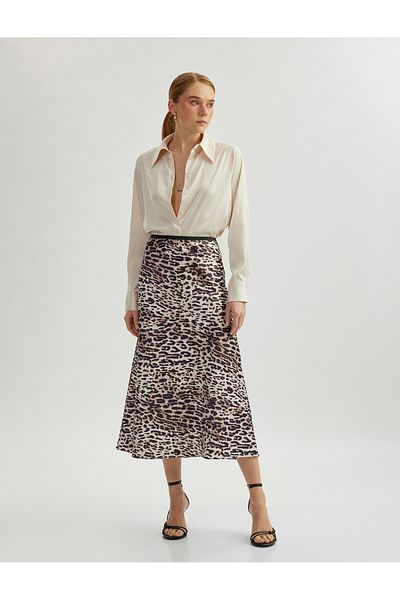 Koton Midi-length A-line leopard print skirt.