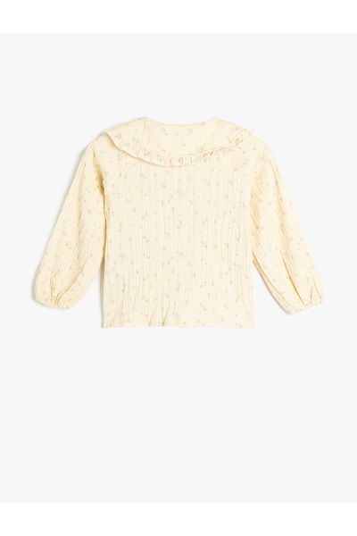 Koton Cotton floral ruffled long sleeve peter pan neck shirt.