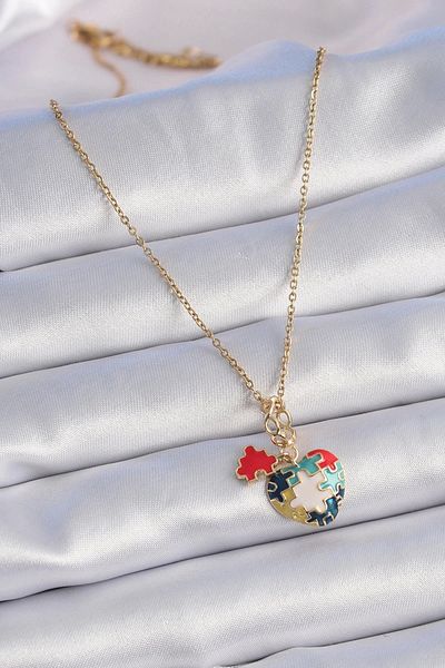 Store 316l الصلب الذهب اللون بازل قطع عزر القلب الشكل سحر نموذج قلادة المرأة