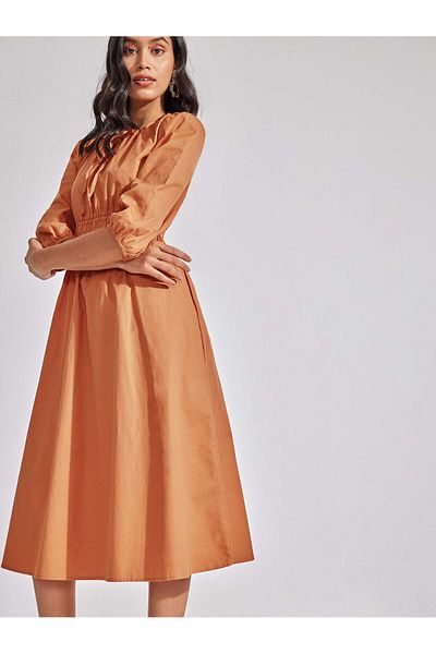 The Label Life Caramel Smocked Midi Dress Chic & Flowy