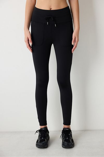 Penti Schwarze, bequeme, knöchellange Leggings mit hoher Taille und Taschendetail