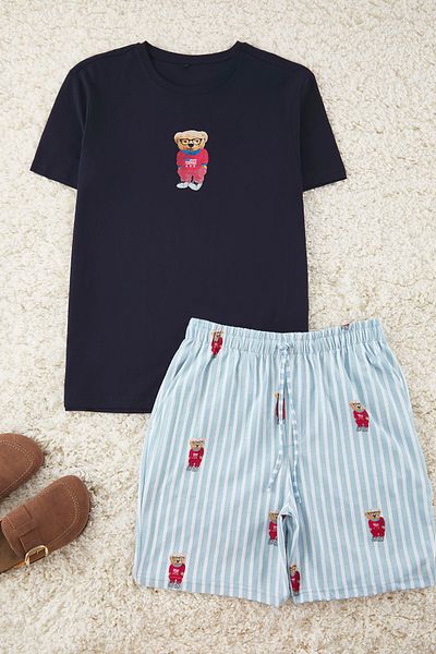 Trendyol Collection Σετ πιτζάμες με πλεκτό σορτς με στάμπα μπλε κανονική εφαρμογή TMNSS24PT00034