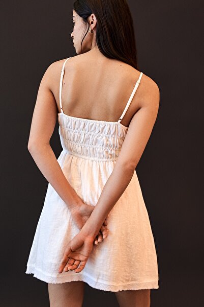 Bershka Ruffled rustic mini dress