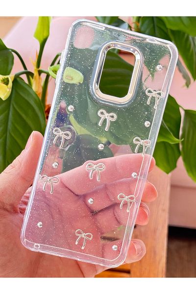 Fibaks حافظة هاتف Xiaomi Redmi Note 9 Pro - 9S بنمط فيونكة شفافة فضية لامعة مع غطاء لامع للكاميرا