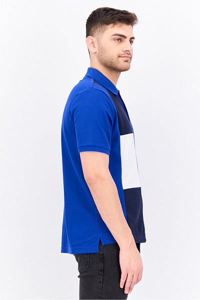 Nautica قميص بولو رجالي بقصّة عادية وأكمام قصيرة وشعار مطرز، أزرق