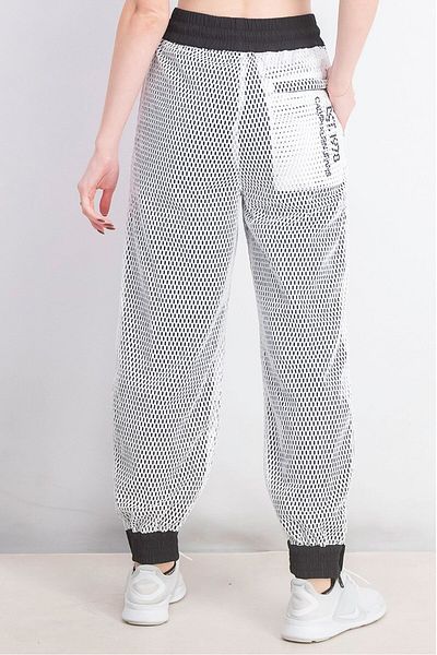 Calvin Klein Jeans Women Regular Fit Textured Jogger Pants, White And Black