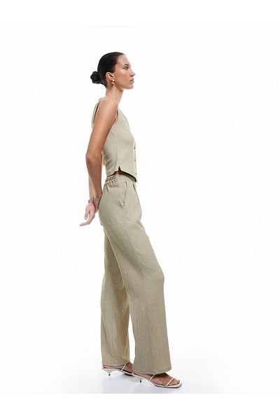 Koton Regular Fit Pocketed Wide Leg Fabric Trousers with Pleats