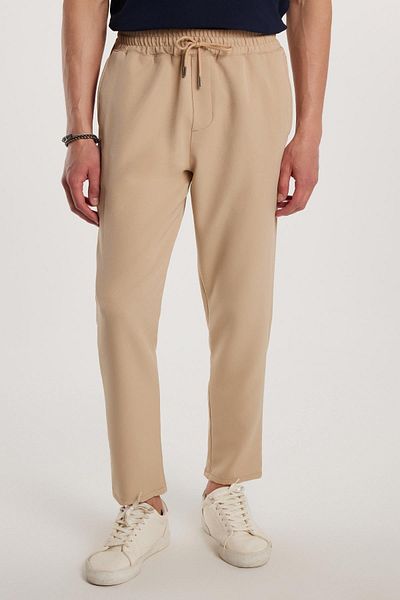 Tudors Ανδρικό Jogger Beige παντελόνι με ελαστική μέση με κορδόνια με χαλαρή εφαρμογή και πλαϊνές τσέπες