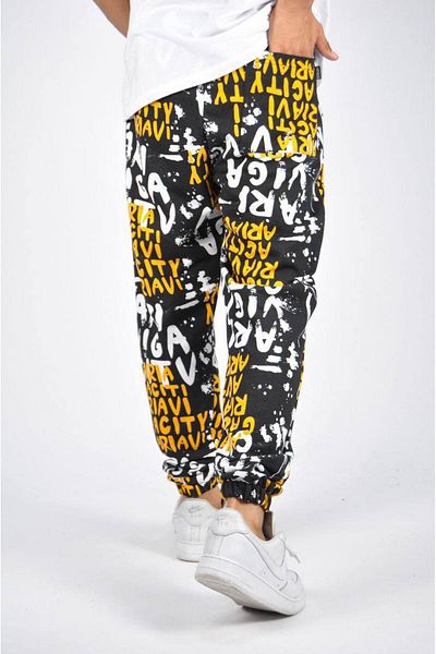 SUPERBLUE Men's Text Patterned Flexible Loose Yellow Jogger Pants