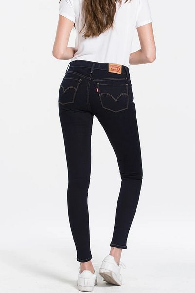 Levi's بنطال جينز نسائي 710 فائق النحافة بخصر منخفض باللون الأزرق الداكن 17778-0047