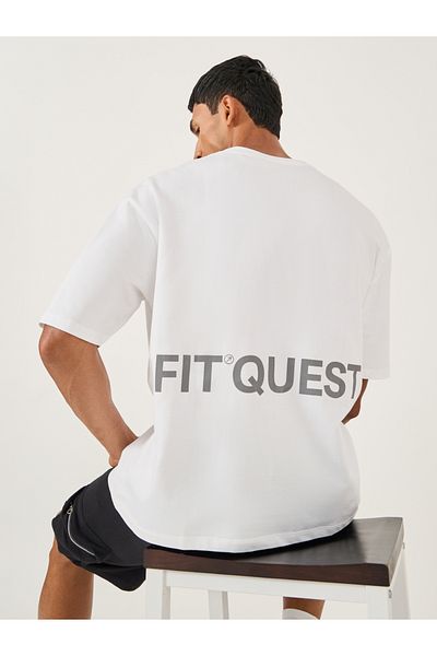 Styli Oversized Slogan Printed Round Neck T-Shirt