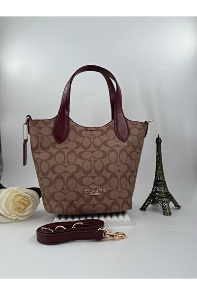 LEAUDER WOMEN   حقيبة دلو نسائية ذات قصة متماثلة متوسطة الحجم باللون الذهبي مزدوجة التخمير الداخلي من Coac-H Hanna