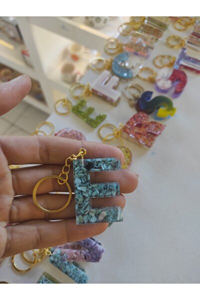 Home سلسلة مفاتيح على شكل حرف "E" من الإيبوكسي - موضوع هدية