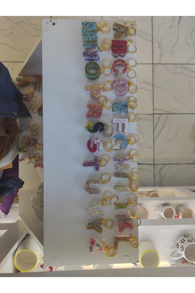 Home سلسلة مفاتيح هدية إيبوكسي حرف "T"