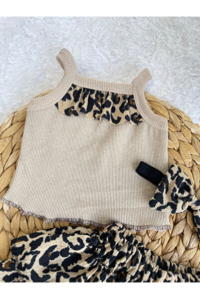 AKİF GİYİM KIZ ÇOCUK LEOPAR DESEN FIRFIRLI ETEK BLUZ BANDANA VE ÇORAP TAKIMI 4 LÜ SET