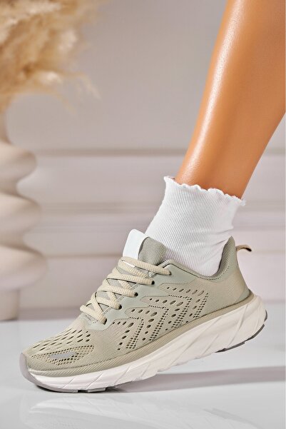 Joana Adida i de dam Textil Verde Yomna