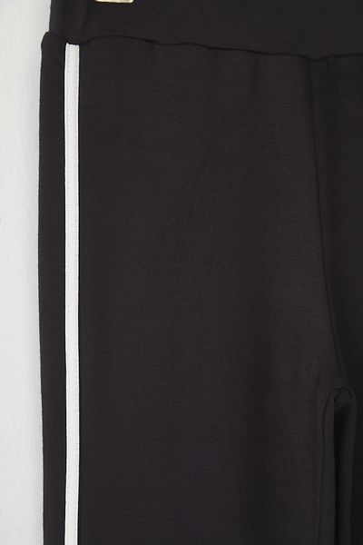 TRENDYOLKIDS Schwarze Mädchen-Strickhose aus Baumwolle mit Paspelierung und weitem Bein TKDSS25PL00015