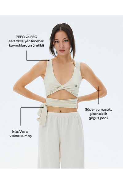 Ayma Active Κρεμ γυναικείο μπουστάκι γιόγκα με συσπειρωμένο μπροστινό μέρος και δεμένο στη μέση