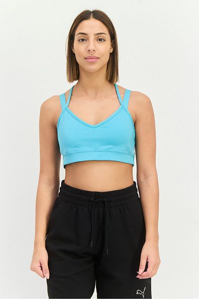 Puma حمالة صدر رياضية مبطنة قليلاً للنساء، لون أزرق مائي