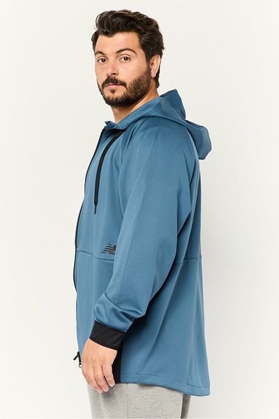 New Balance جاكيت تدريب رجالي رياضي بأكمام طويلة، أزرق/أسود