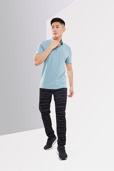 Kenneth Cole Men Regular Fit Solid Short Sleeve Polo Shirts, Faded Blue