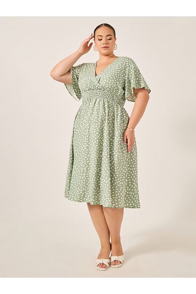 Styli Plus Size All-Over Printed V Neck A-Line Midi Dress