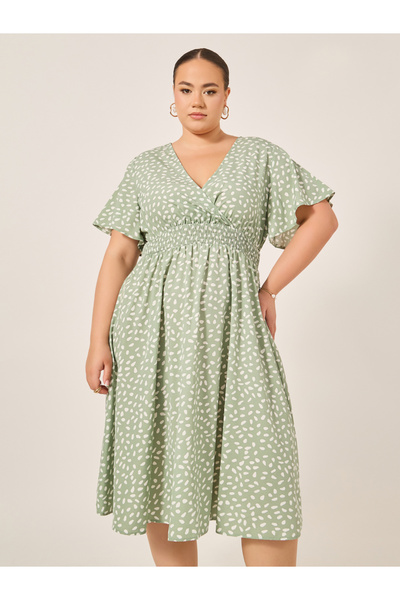 Styli Plus Size All-Over Printed V Neck A-Line Midi Dress