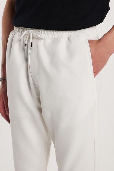 Tudors Ανδρικό Jogger Λευκό Παντελόνι με Ελαστική Μέση Lace Up με χαλαρή εφαρμογή και πλαϊνές τσέπες