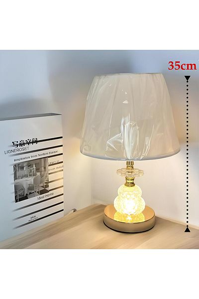 ALSAIF KITCHEN Table lamp lighting, an elegant decorative addition that changes the atmosphere. Attractive golden color design.