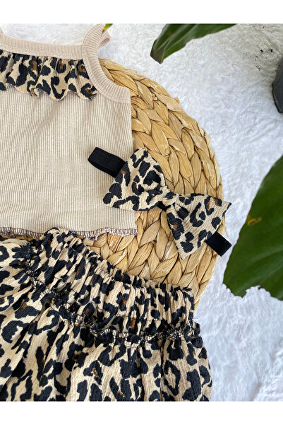 AKİF GİYİM KIZ ÇOCUK LEOPAR DESEN FIRFIRLI ETEK BLUZ BANDANA VE ÇORAP TAKIMI 4 LÜ SET