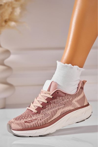 Joana Adidas and the dam Textil Maro Brella