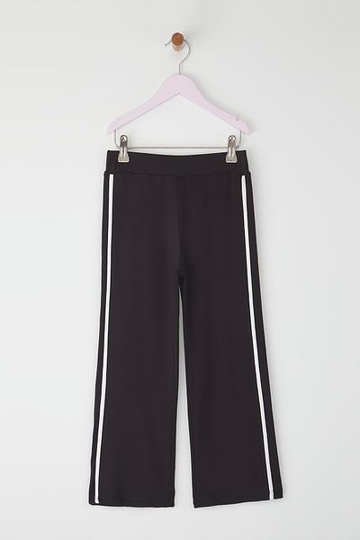 TRENDYOLKIDS Schwarze Mädchen-Strickhose aus Baumwolle mit Paspelierung und weitem Bein TKDSS25PL00015