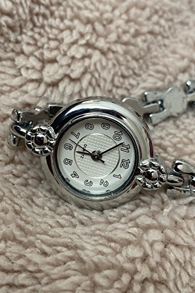 İnogge الحد الأدنى من ساعة اليد النسائية الفضية مع سلك زهرة