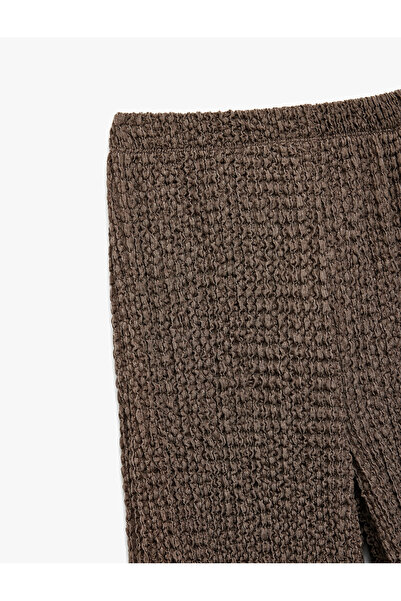 Koton Beli Lastikli Dokulu Geniş Paça Pantolon