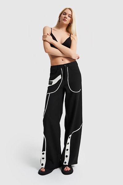its basic Women's Black and White Color Split Leg Detailed Design Loose Trousers