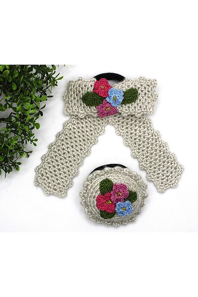 Tezcan Aksesuar Cataramă din cauciuc model cu fundă florală tricotată manual (pachet de 2)