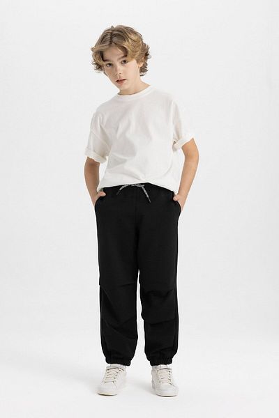 DeFacto Schwarze Basic-Jogger-Jogginghose mit elastischem Bund und Taschen für Jungen C2093a824sp